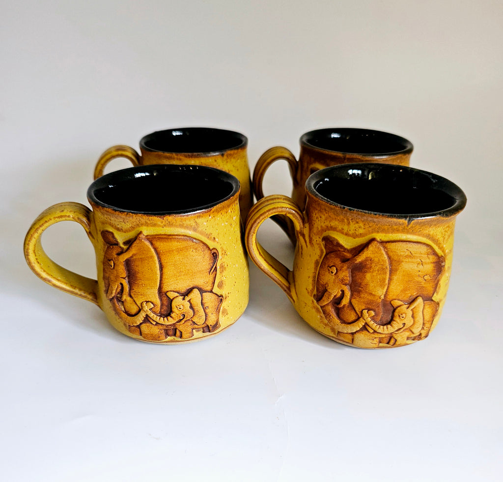 Vintage Set of Four Ceramic Earthenware Hand-Made Pottery Mugs Featuring a 3D Design of an Elephant