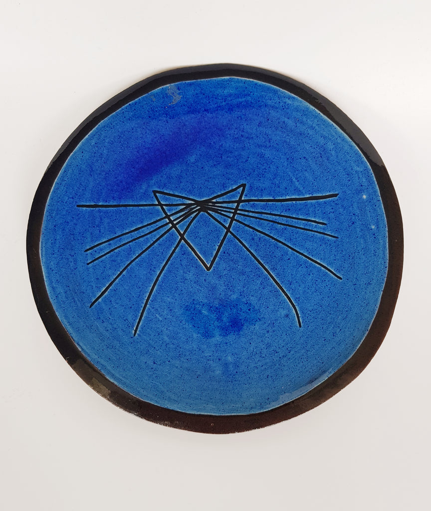 A beautiful Terracotta Studio Art Pottery Plate signed by the artist