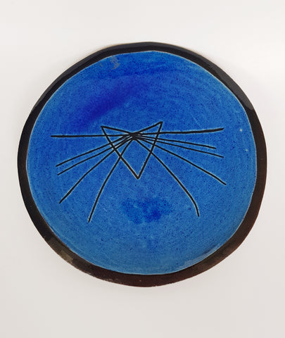 A beautiful Terracotta Studio Art Pottery Plate signed by the artist