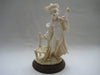 Handcrafted Vittorio Tessaro Boy Figurine in Capodimonte on a wooden stand