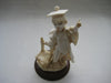 Handcrafted Vittorio Tessaro Boy Figurine in Capodimonte on a wooden stand