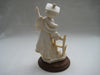 Handcrafted Vittorio Tessaro Boy Figurine in Capodimonte on a wooden stand