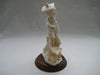 Handcrafted Vittorio Tessaro Boy Figurine in Capodimonte on a wooden stand