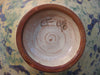 Contemporary Design Ceramic Bowl in yellow with blue and green pattens all around, signed by the artist as CF 98