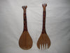 Hand carved wooden spoon and fork with handles carved as giraffes
