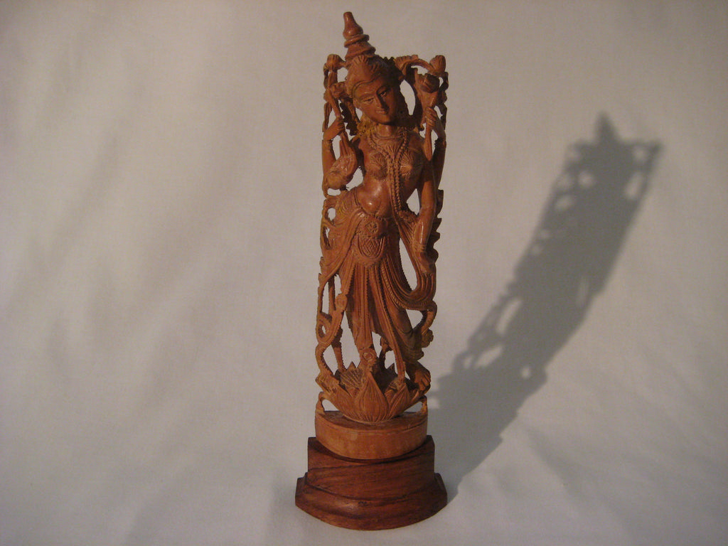 Antique wood carved sculpture of a Hindu Goddess in sandalwood
