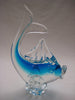 Murano style glass dolphine figurine in clear glass and translucent blue.