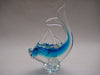 Murano style glass dolphine figurine in clear glass and translucent blue.