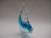Murano style glass dolphine figurine in clear glass and translucent blue.