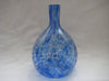 Bottle with a handle in clear glass with streaks of blue