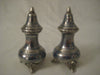 Ornamental metal salt and pepper shaker