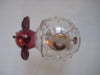 Perfume bottle in clear and maroon colour glass with gold trimmings in the shape of an elephant