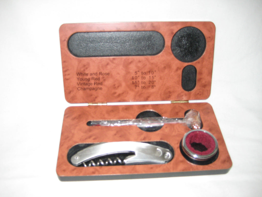 Wooden box containing wine accessories