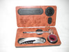 Wooden box containing wine accessories