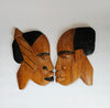 A Pair of Rare Vintage African Hand Carved Wall Hanging Wooden Sculptures, Featuring Faces of a Man and a Woman Facing Each Other
