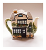 Vintage Annie Rowe Novelty Teapot Featuring an Antique's Shop