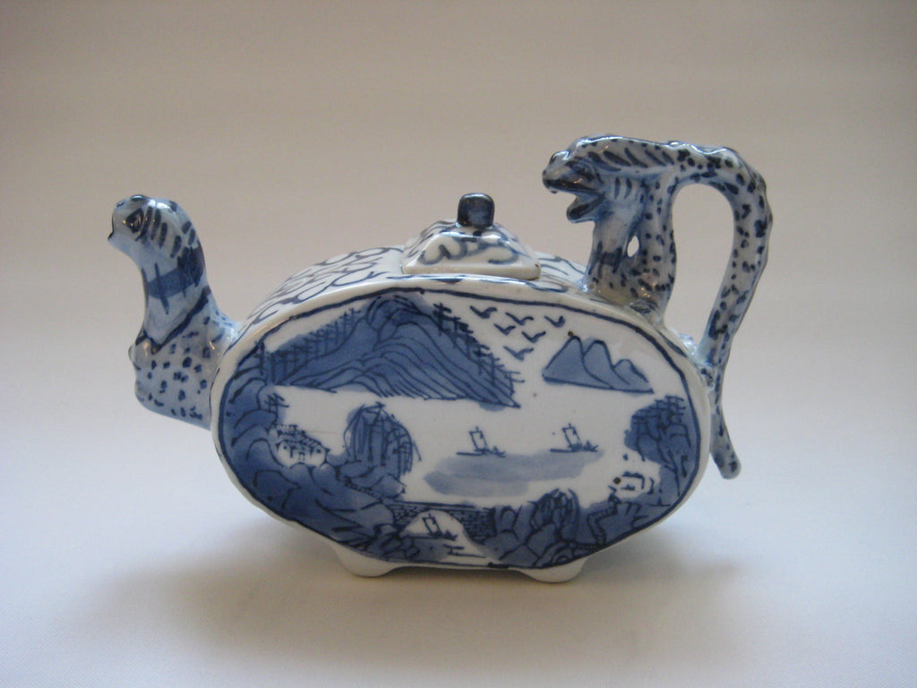 https://one-offs.net/cdn/shop/products/Chinese_Blue_and_White_Teapot_001_1024x1024.JPG?v=1571264519