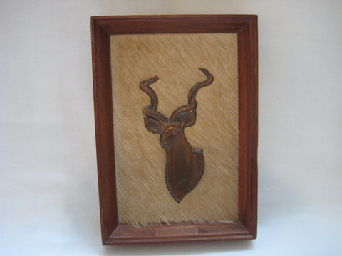 Vintage Kudu (a species of Antelope) sculpture in copperware mounted on genuine Antelope skin in a wooden frame