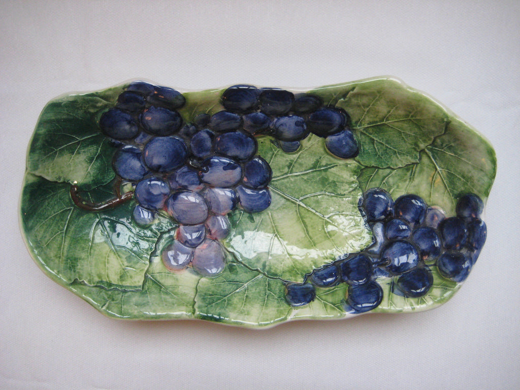 Italian Hand Painted Majolica embossed shallow bowl with vine leaves and grapes pattern
