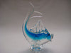 Murano style glass dolphine figurine in clear glass and translucent blue.