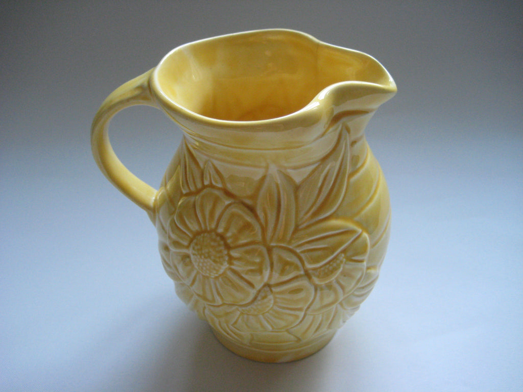 Yellow Jug in Floral Raised Pattern